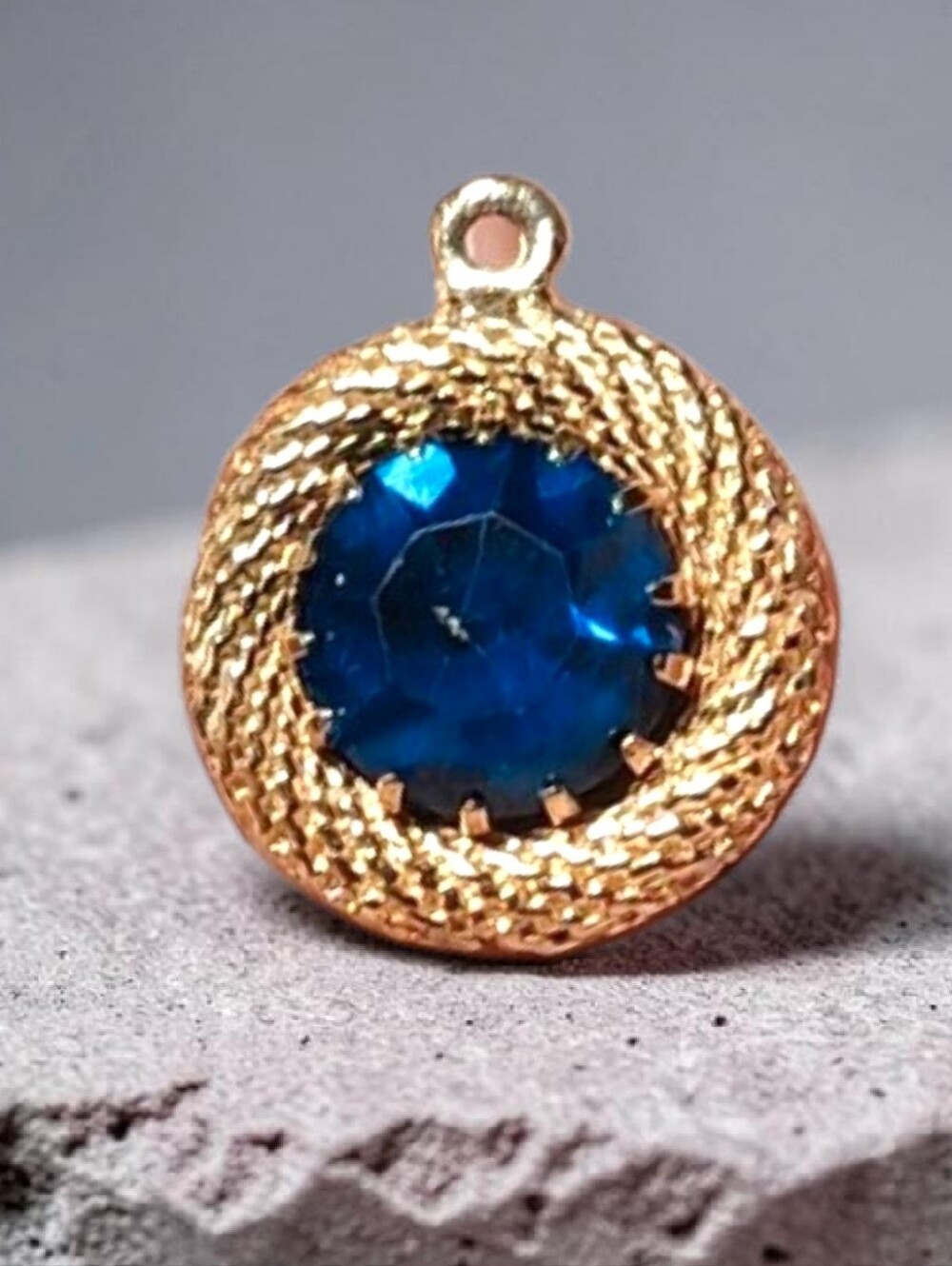 Vintage Gold-Tone Pendant with Deep Blue Faceted Stone